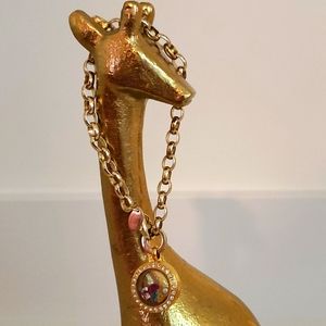 Origami Owl gold bracelet with jewels and a pearl.